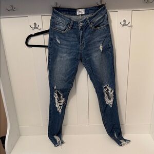 Distressed Blue Jeans